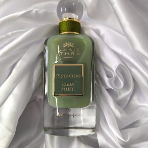 Image d'une bouteille verte du parfum de dubai pistachio