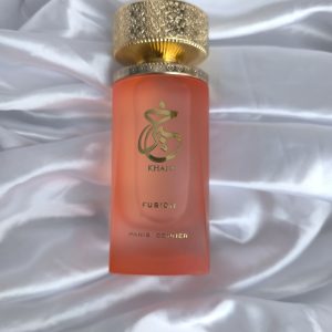 Bouteille de parfum rose le Khair Fusion