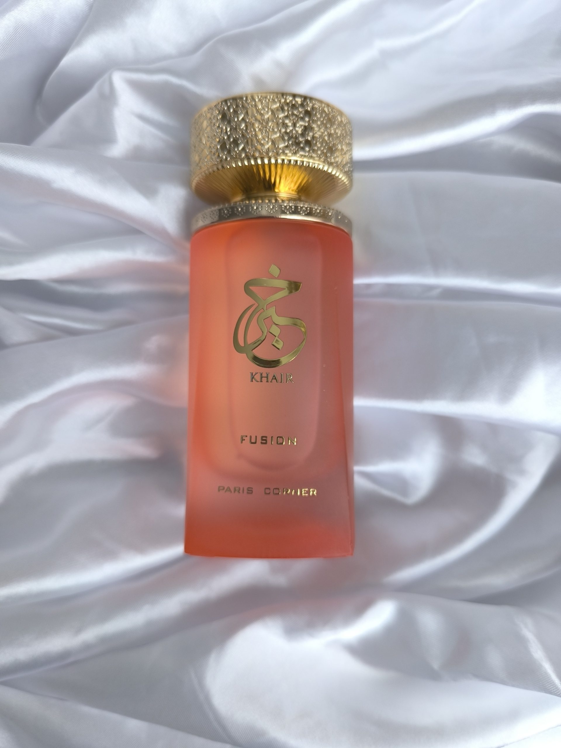 Bouteille de parfum rose le Khair Fusion